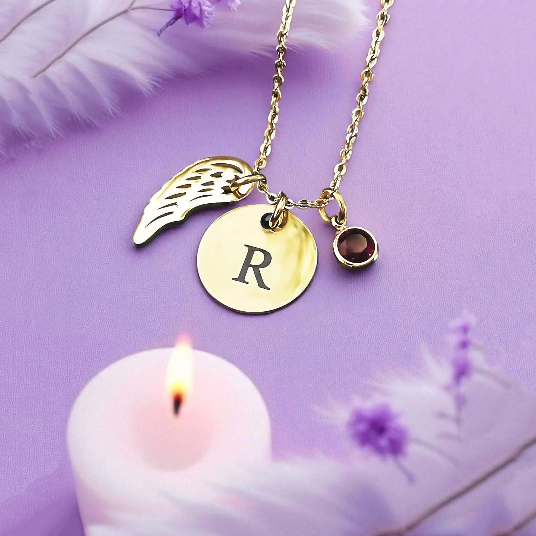 Memorial necklace with angel wing charm and personalised initial disc by Belle Fever, handcrafted in non-tarnish Monel materials for remembrance and comfort