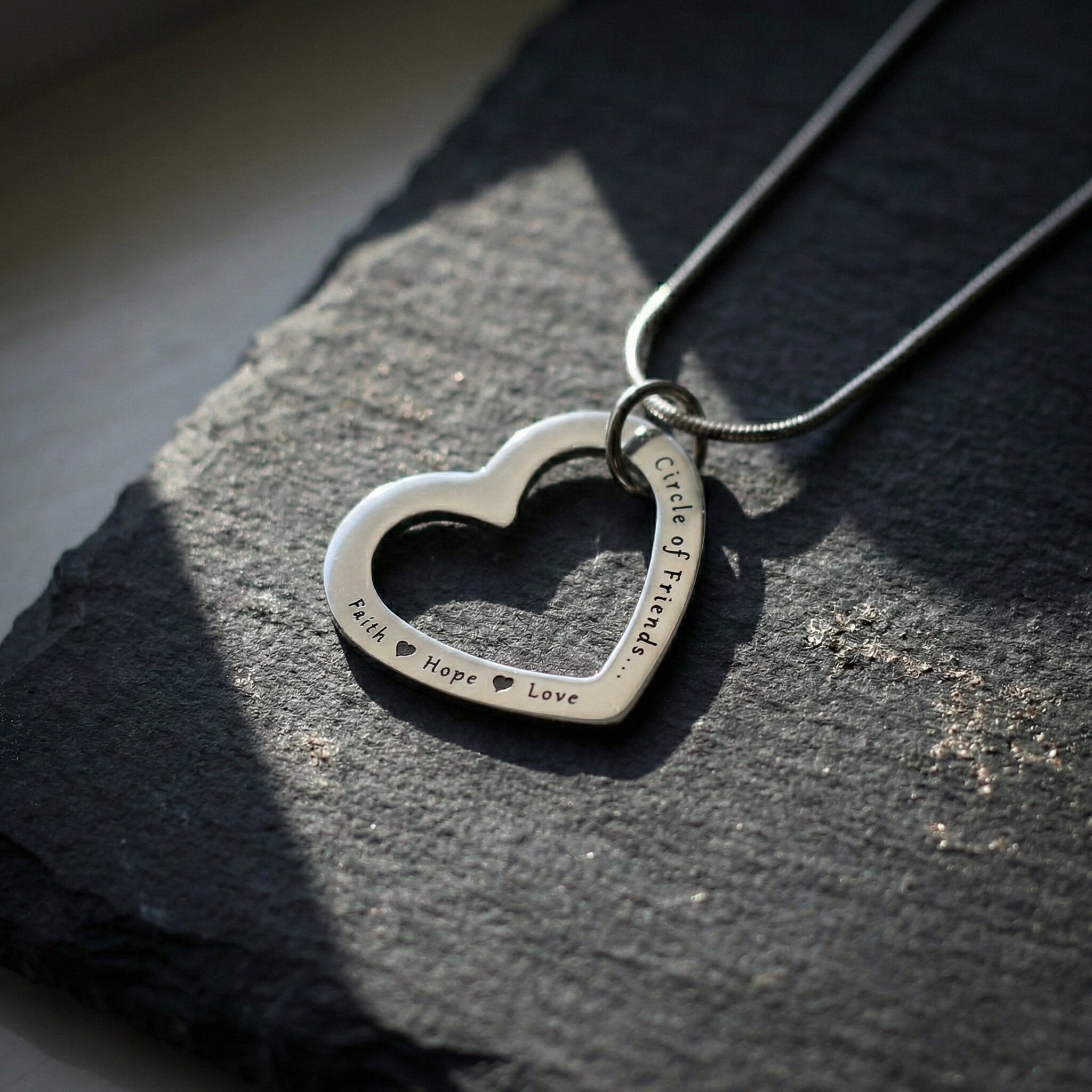 Belle Fever Always In My Heart necklace on stone flatlay, engraved name jewellery, memorial keepsake gift