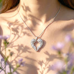 Belle Fever gold angel heart necklace worn by model elegant and symbolic jewellery, perfect for everyday wear or as a heartfelt gift