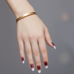 Personalised Endless Open Cuff Bangle by Belle Fever — sleek gold design worn with sophistication, symbolising eternal love, unity, and timeless beauty.