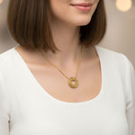 Interlinked Family Love Circles Necklace — gold personalised pendant worn with a white top, a timeless keepsake symbolising family love and togetherness.