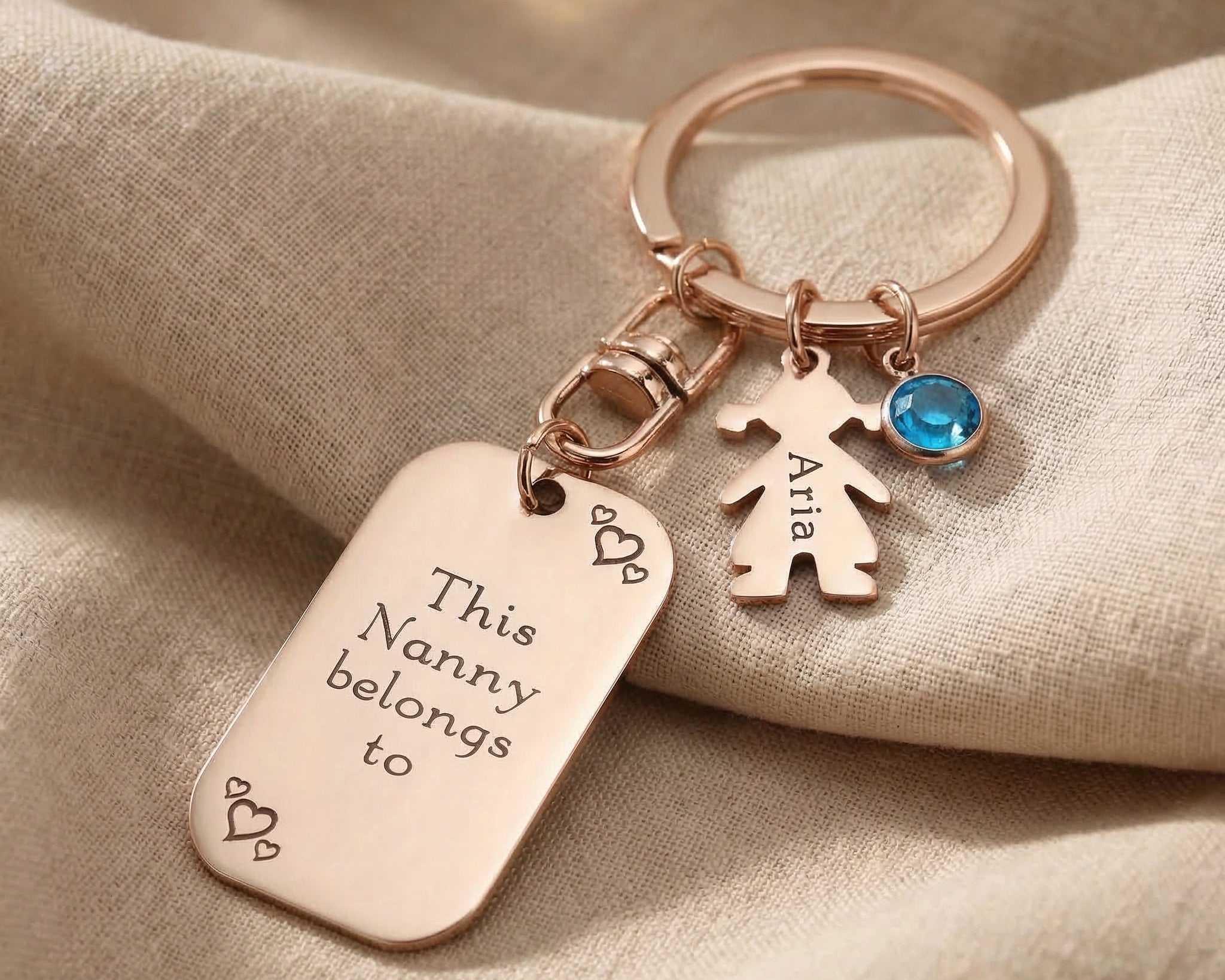 Kids Love Tag Keyring in rose gold with engraved heart disc and charm, meaningful keepsake gift
