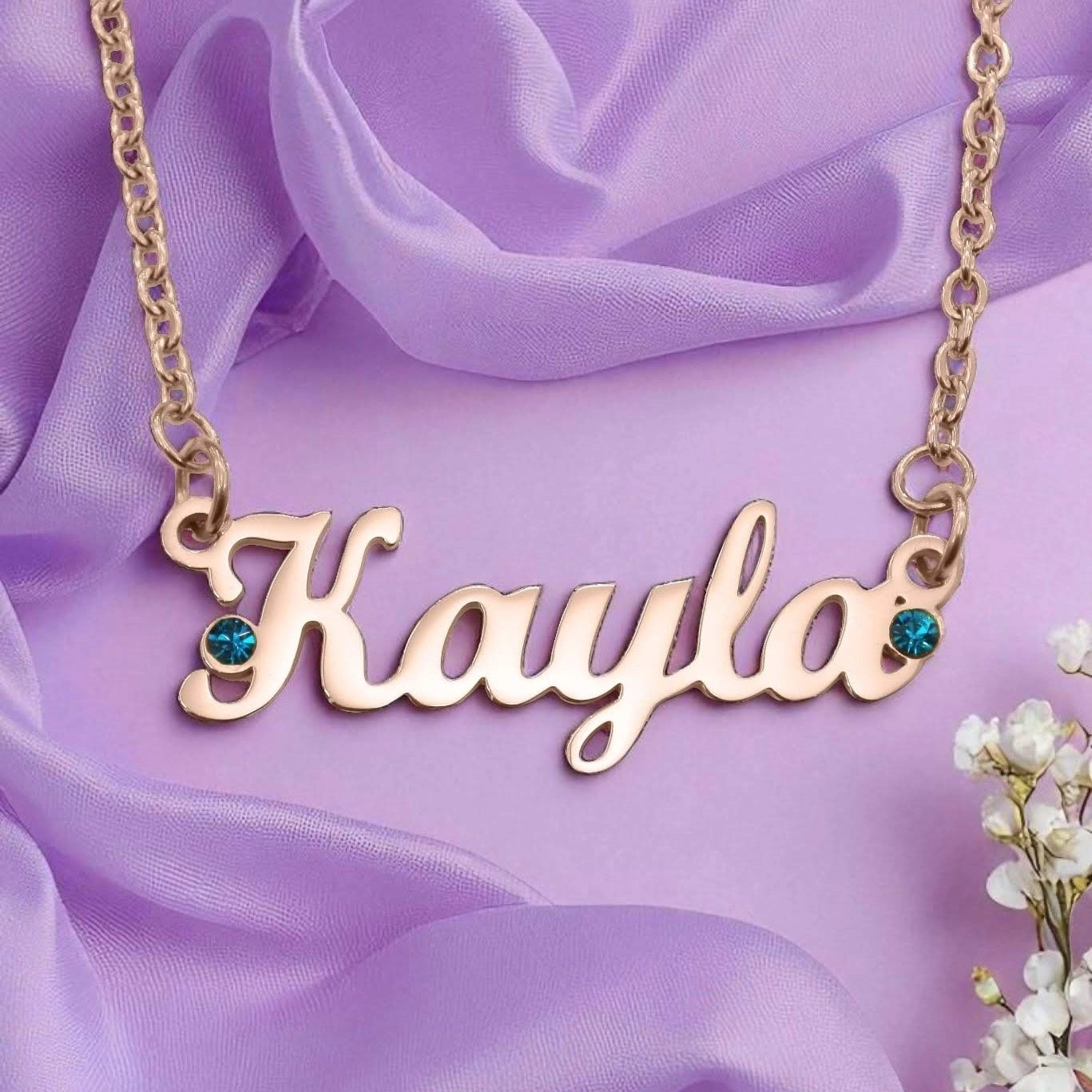 Belle Fever Name Necklace — elegant gold name pendant with sparkling birthstones, handcrafted to celebrate individuality, love, and precious memories.