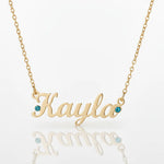 Gold Belle Fever Name Necklace with turquoise birthstones — a handcrafted keepsake symbolising love, beauty, and the joy of self-expression.