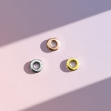 Belle Fever Stopper Beads in silver, gold, and rose gold — crafted to complement your New Moments Bracelet and add both function and style to your treasured piece.