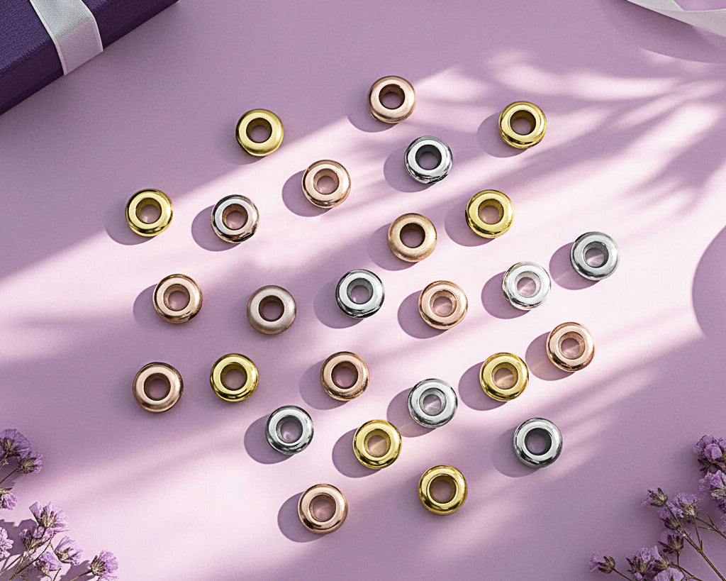 Collection of Belle Fever Stopper Beads in gold, silver, and rose gold — stylish and practical accessories to secure and balance your charm bracelet design