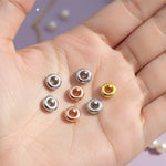 Belle Fever Additional Stopper Beads — mixed metal set in gold, rose gold, and silver, handcrafted to secure charms and enhance your New Moments Bracelet.