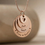 Rose gold Tower of Love necklace with stacked round charms, minimalist jewelry design by Belle Fever