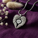Angel Heart Necklace, silver wing pendant embracing a personalised heart charm, a touching memorial keepsake by Belle Fever jewellery