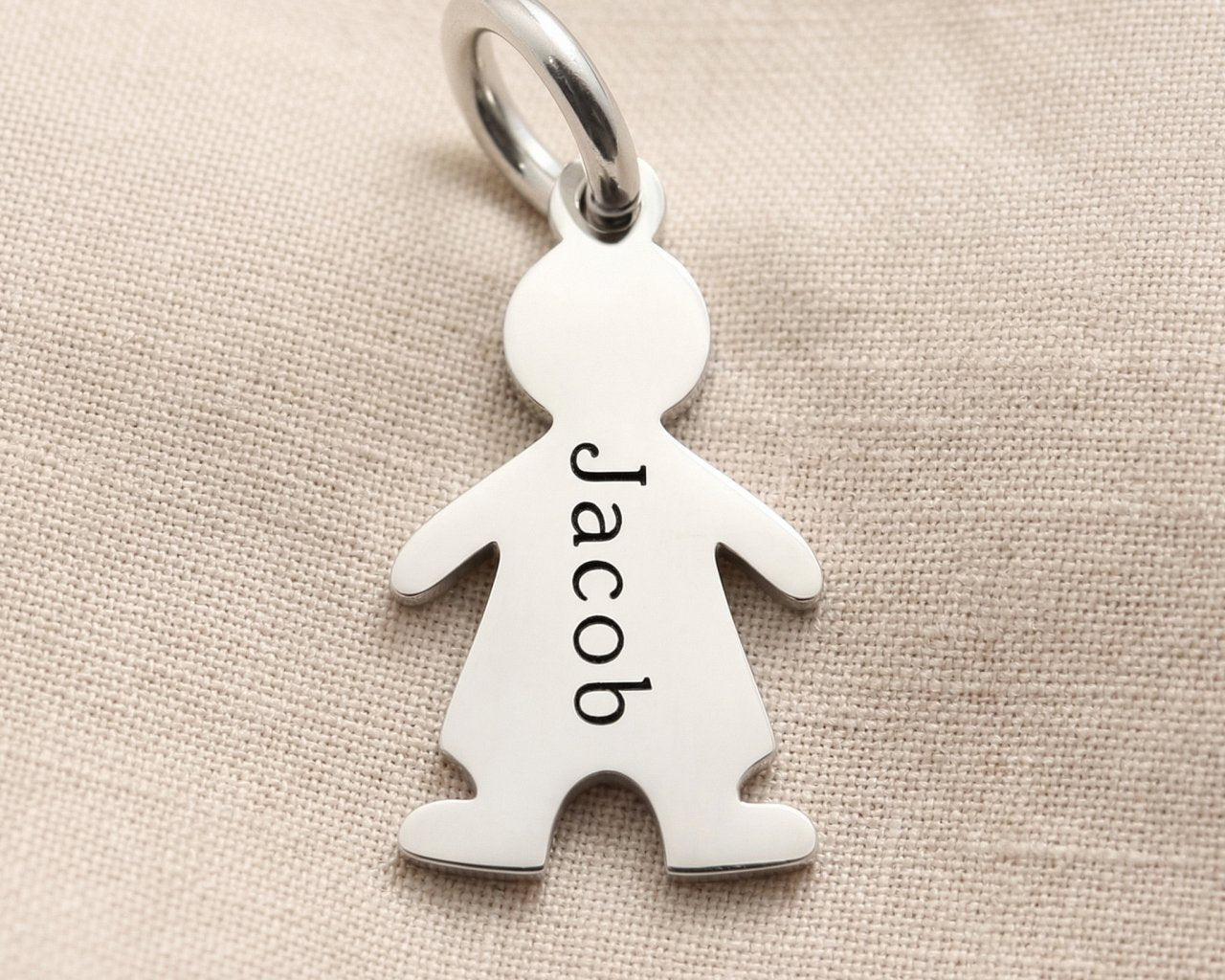 Personalized boy silhouette charm for keyring with custom engraved name and meaningful family keepsake design