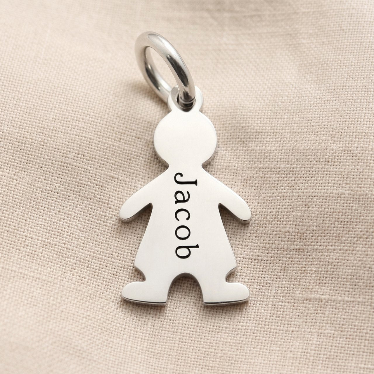 Personalized boy silhouette charm for keyring with custom engraved name and meaningful family keepsake design