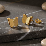 Delicate sparkling butterfly stud earrings designed for everyday comfort by Belle Fever