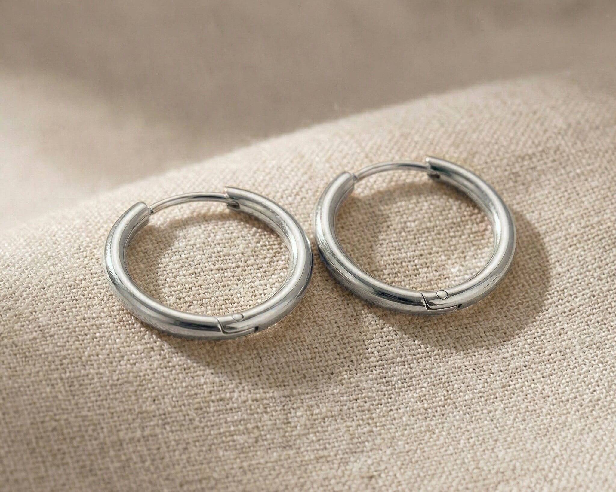 Silver chic sleeper hoop earrings with smooth polished hoop design