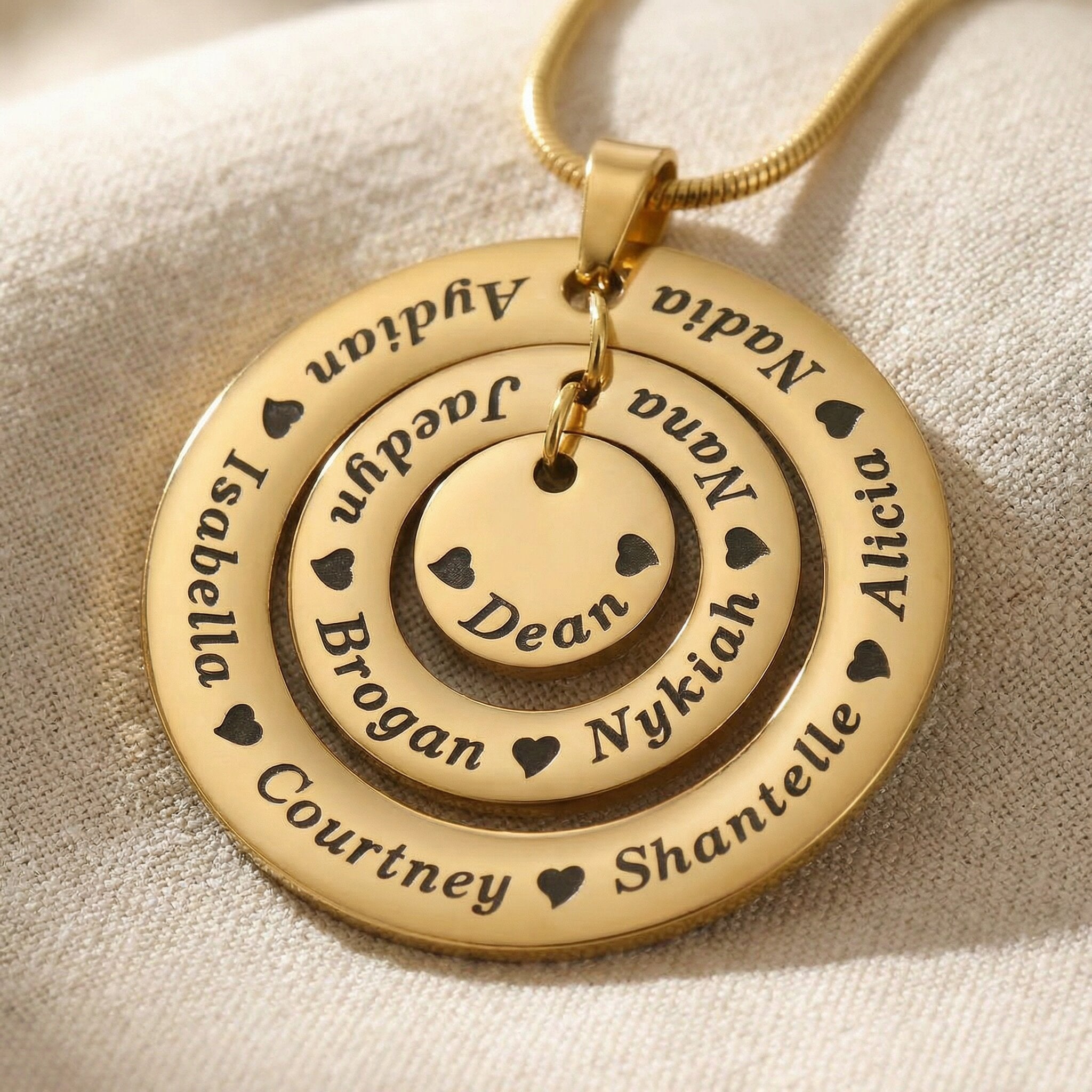 Circle of Loved Ones necklace close up showing engraved names and details