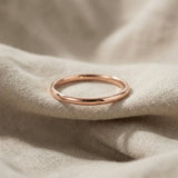 Classic band ring in rose gold with smooth polished finish, elegant minimalist jewellery