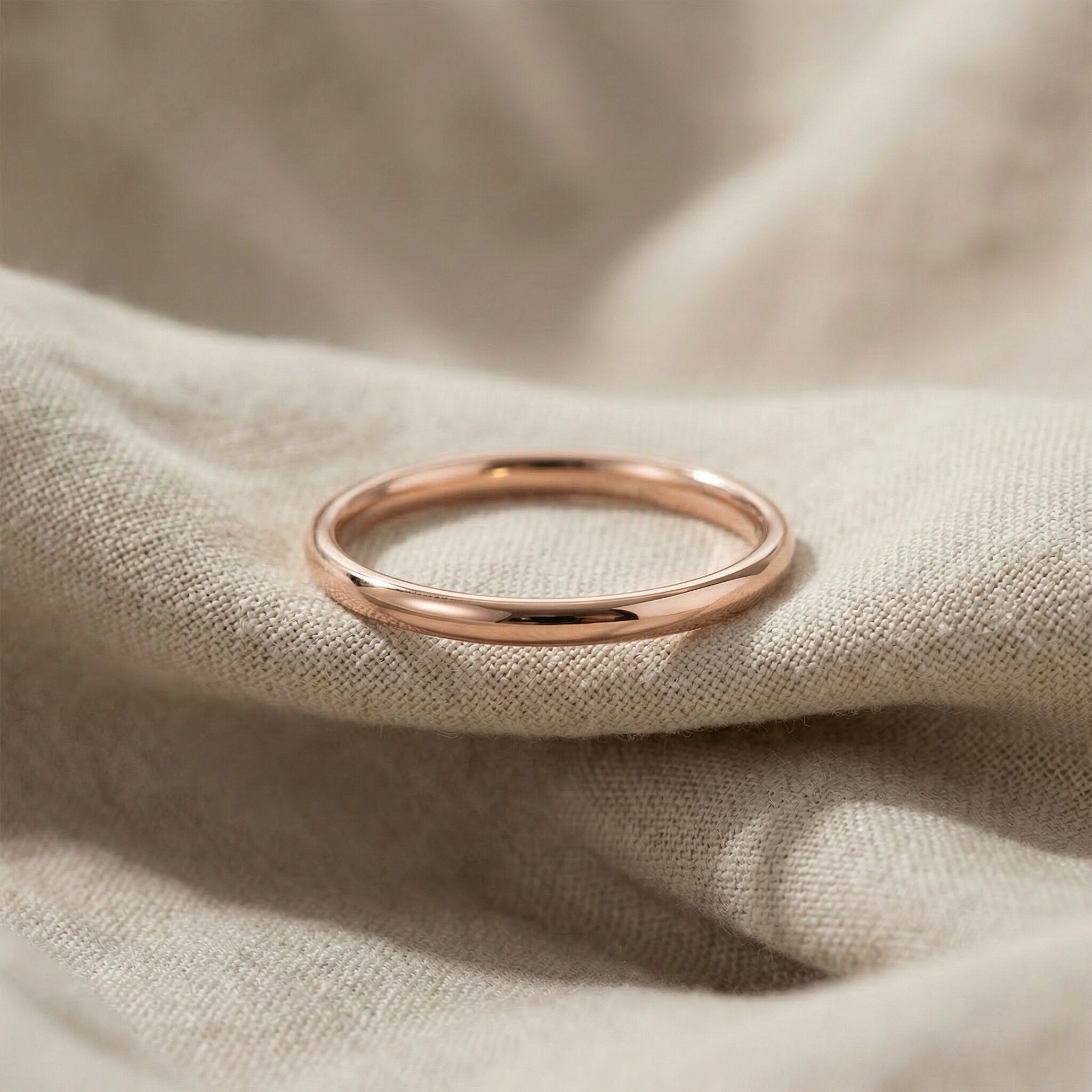Classic band ring in rose gold with smooth polished finish, elegant minimalist jewellery