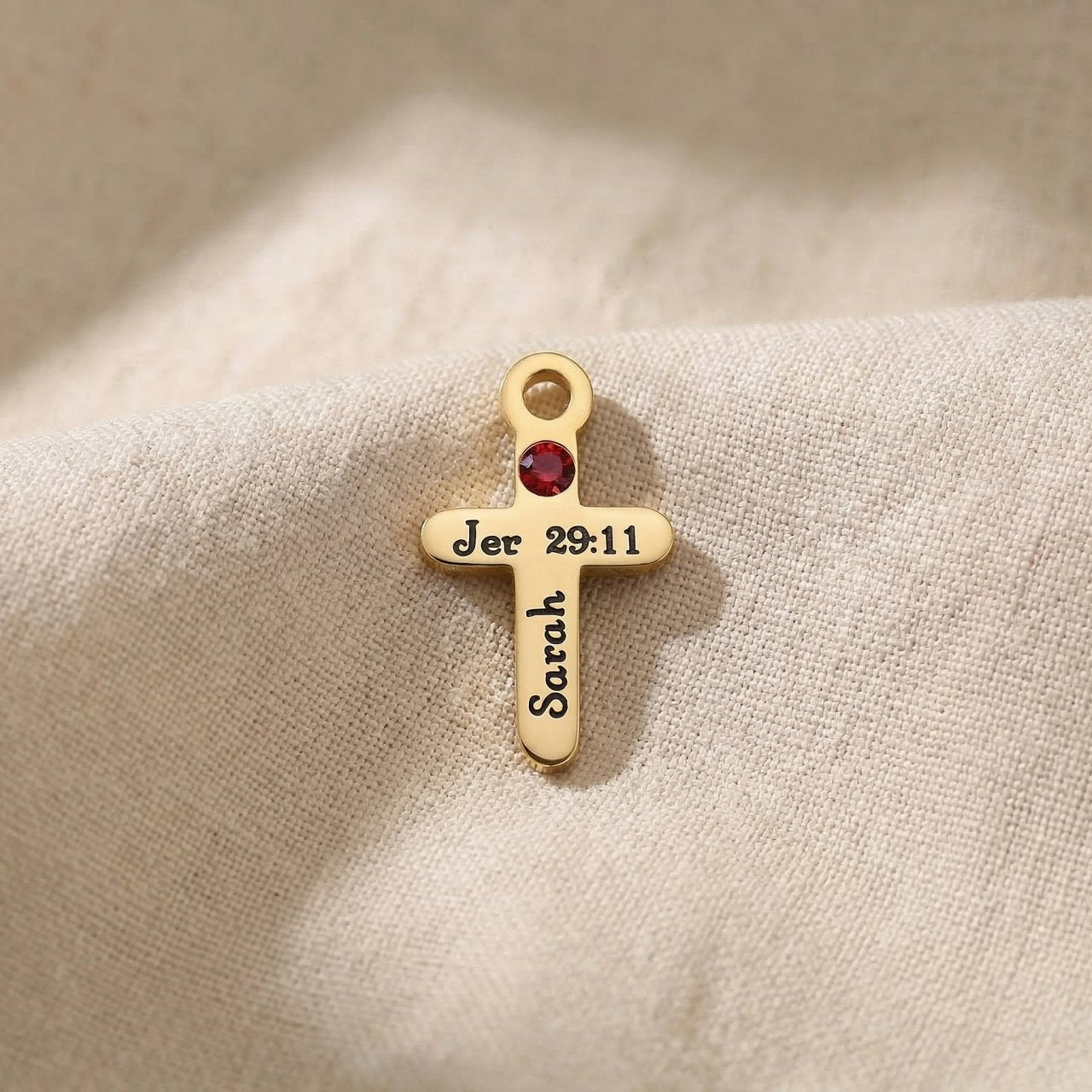 Gold cross birthstone charm for Dream Locket bracelet combining faith symbolism with personalized gemstone detail