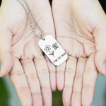 Belle Fever Custom Kids Drawing Dog Tag Necklace — engraved pendant resting in open hands, preserving a child’s drawing forever.