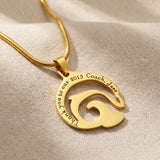 Dolphin necklace in gold with engraved name detail, elegant ocean-inspired jewellery design