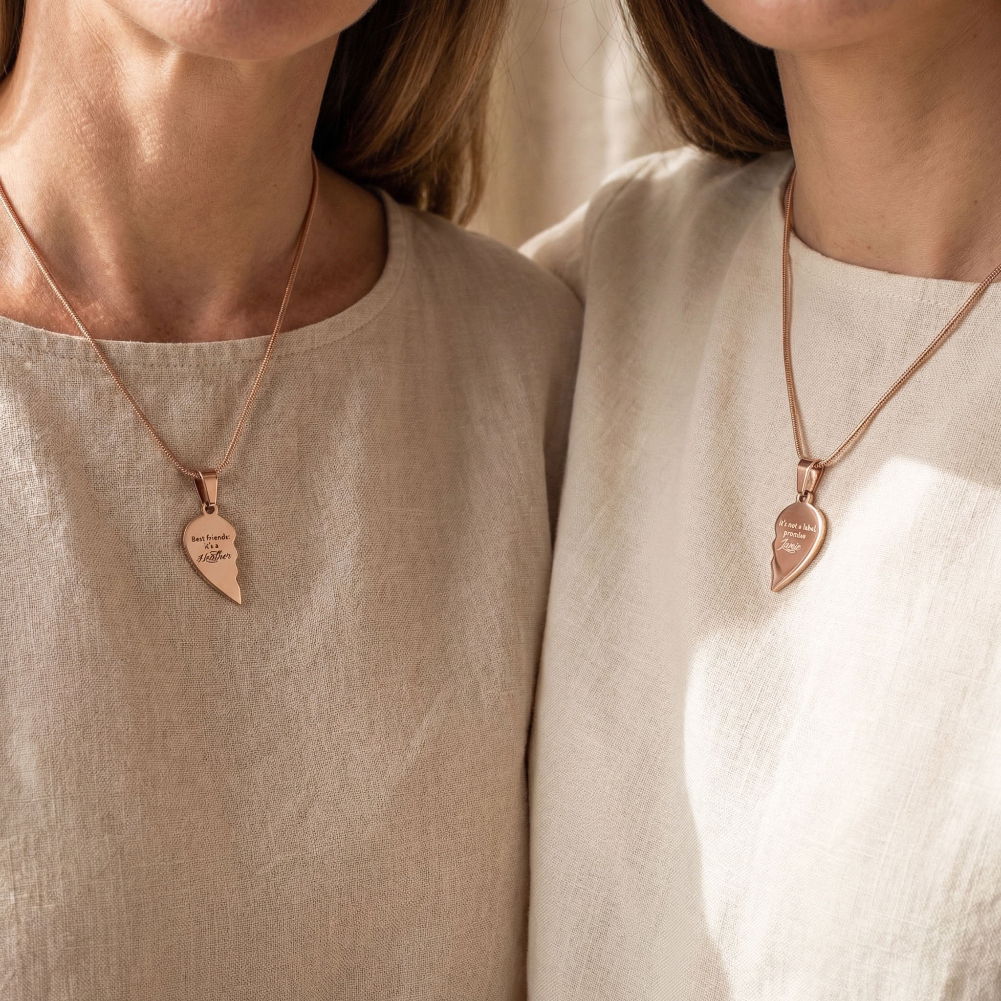 Couple wearing Double Heart Puzzle Necklace set with matching heart pendants, meaningful relationship jewellery
