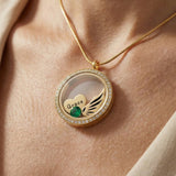 Woman wearing dream locket necklace with personalised insert, meaningful everyday jewellery