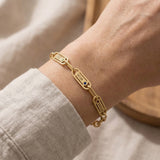 Woman wearing Endless Ties Bracelet with engraved name, personalized link bracelet lifestyle image
