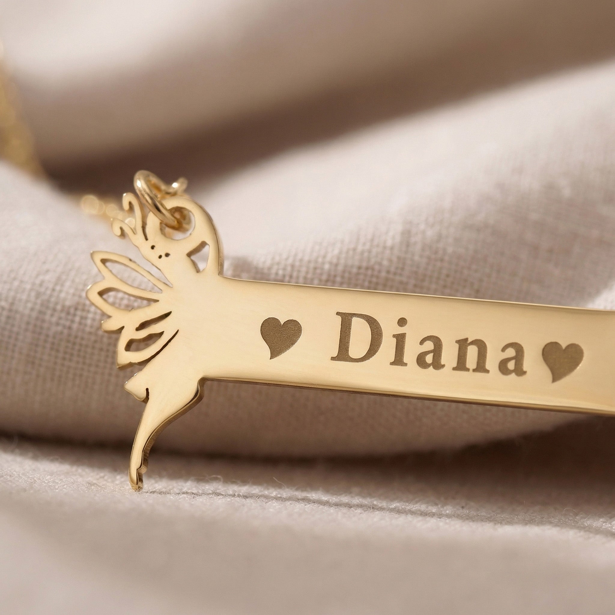 Close-up of Fairy Name Bar Necklace showing engraved name and fine polished detail