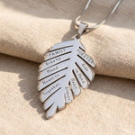 Family leaf necklace in silver with engraved detail, symbolic family jewellery keepsake