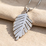 Family leaf necklace in silver with engraved detail, symbolic family jewellery keepsake