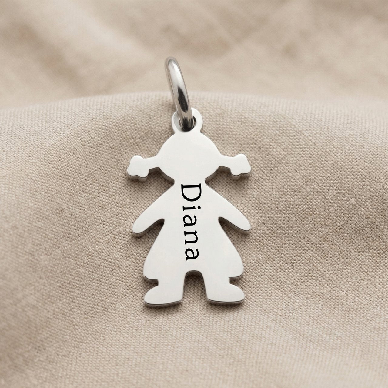 Personalized girl silhouette charm for keyring with engraved name and sentimental family keepsake design