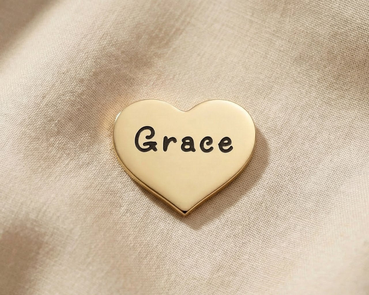 Personalized gold heart charm for Dream Locket bracelet with engraved name and sentimental love keepsake design
