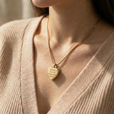 Woman wearing Heart Cremation Necklace with heart pendant, memorial keepsake jewellery lifestyle image