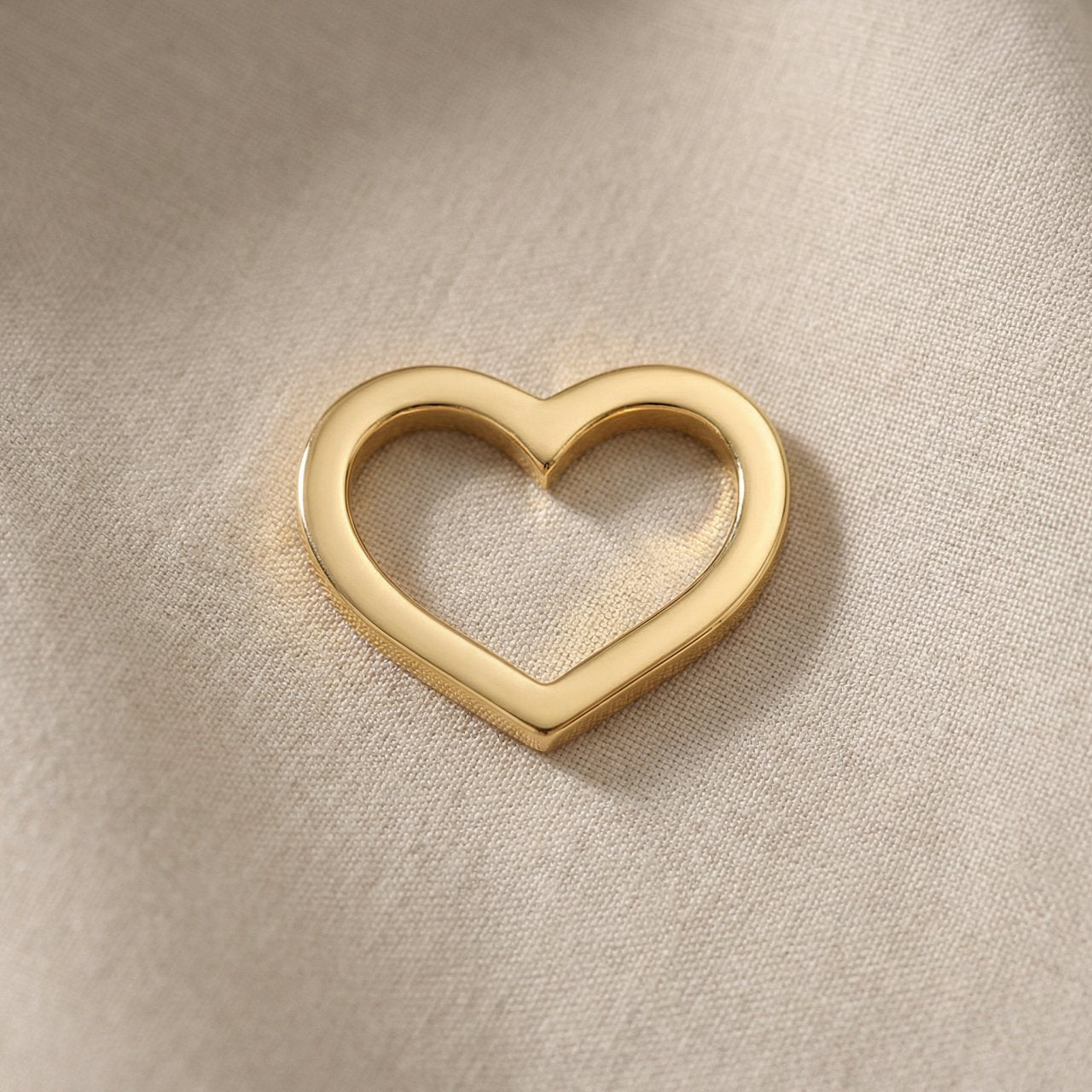 Gold heart outline charm for Dream Locket bracelet symbolizing love, connection, and timeless sentimental memories