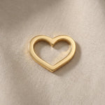Gold heart outline charm for Dream Locket bracelet symbolizing love, connection, and timeless sentimental memories