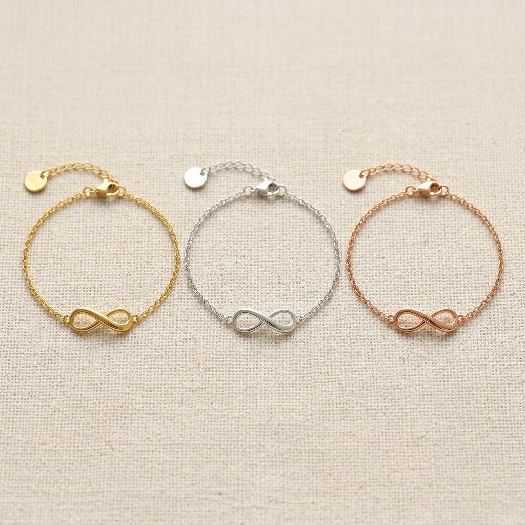 Infinity bracelet in gold silver and rose gold finishes with delicate chain design
