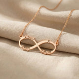 Rose gold infinity name necklace with custom name on infinity pendant design