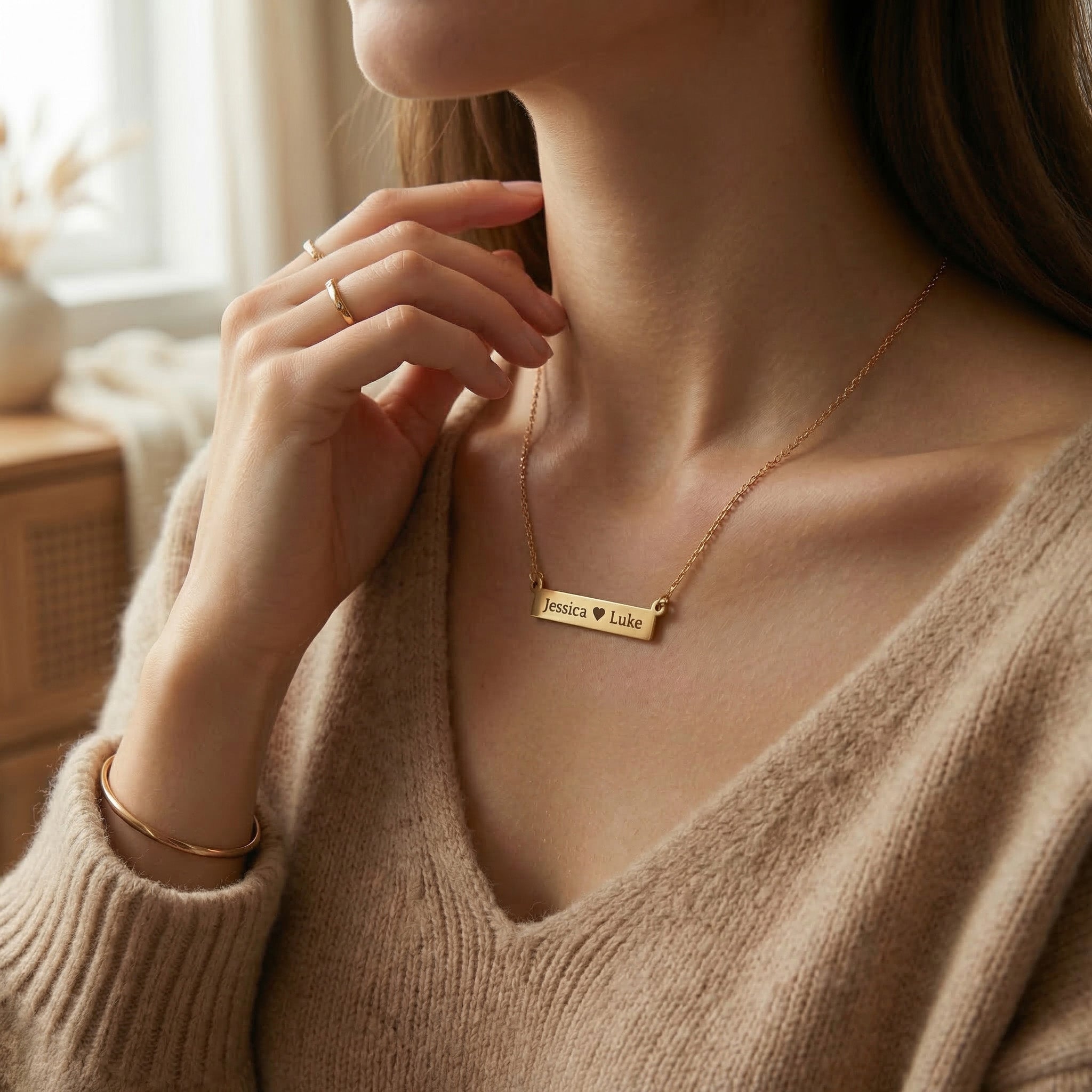 Woman wearing Jess Bar Necklace with engraved name bar, personalised jewellery lifestyle image
