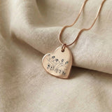 Kids drawing necklace showing heart shape pendant option with custom engraved artwork