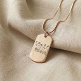 Kids drawing necklace showing dog tag style pendant option with engraved artwork