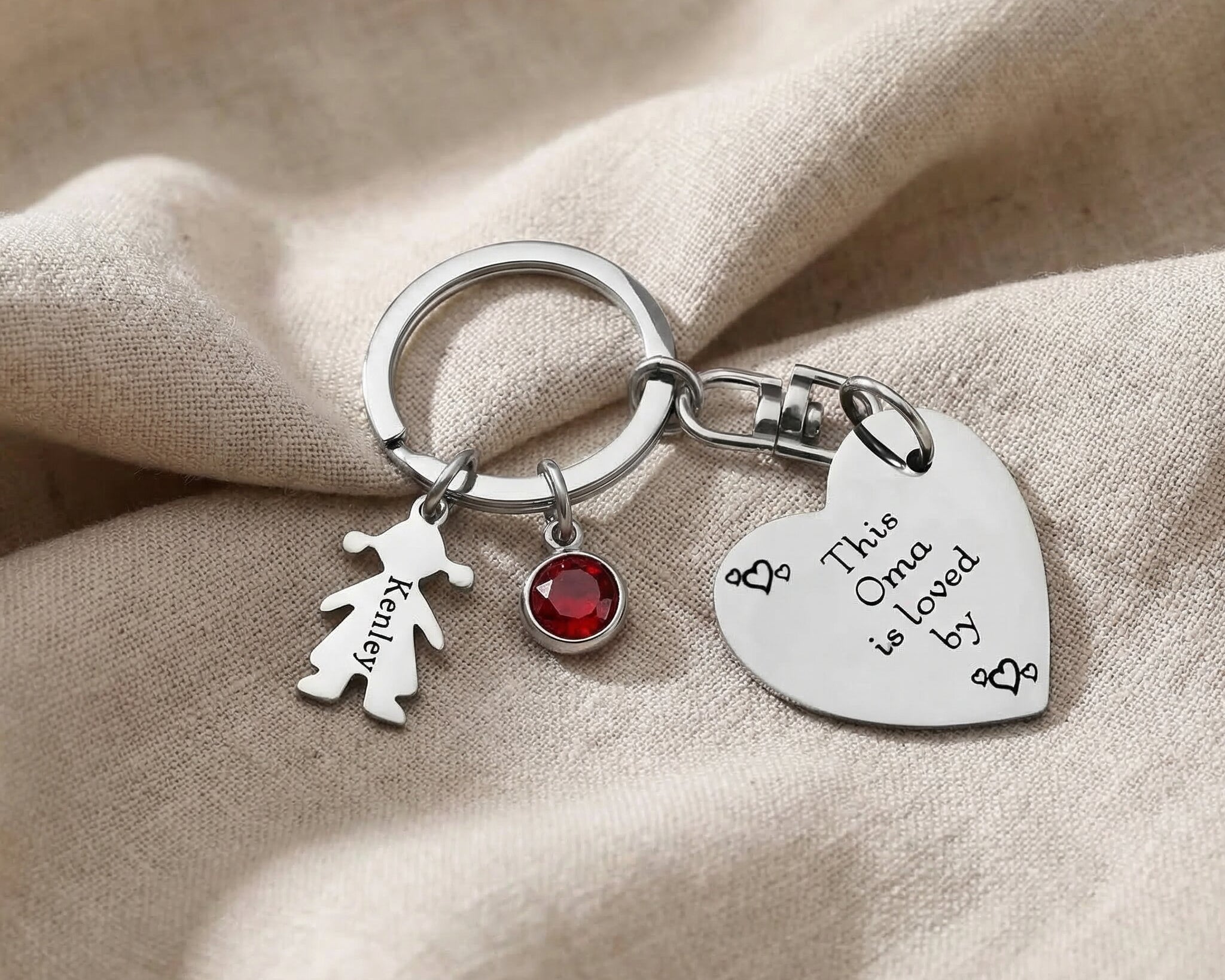 Kids Love Heart Keyring in silver with engraved heart disc and child charm, personalised keepsake