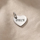 Silver missing piece heart charm for keyring symbolizing love, connection, and meaningful emotional bonds