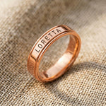 Rose gold personalised band ring with engraved name detail, elegant custom jewelry piece