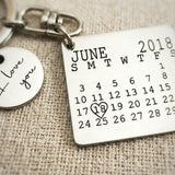 Close up of personalised calendar keyring showing engraved date calendar detail
