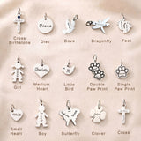 Personalized engraved keyring charm collection with custom names, symbols, pet charms, and meaningful keepsakes