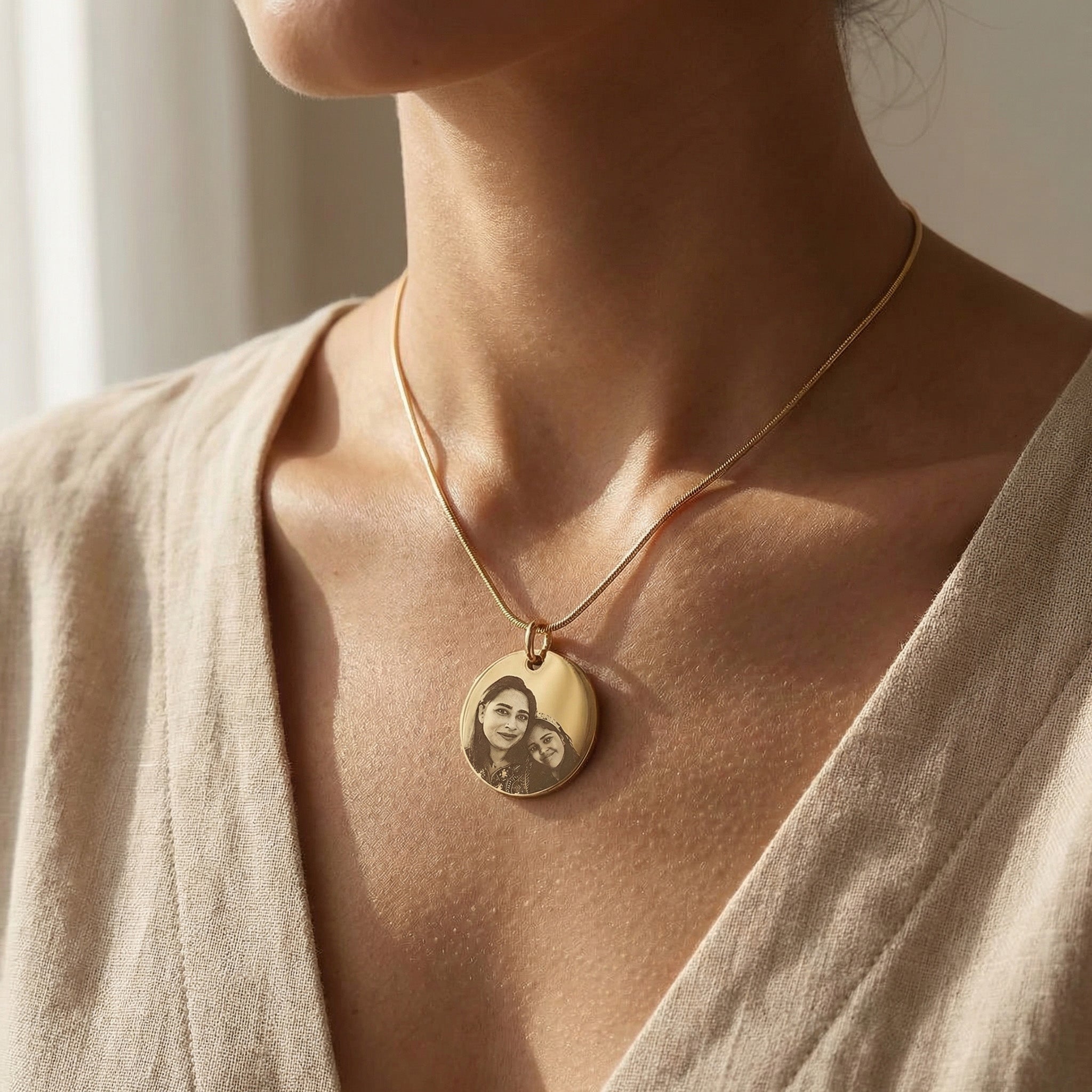 Woman wearing Personalised Disc Pendant necklace with photo engraving, meaningful jewelry lifestyle image