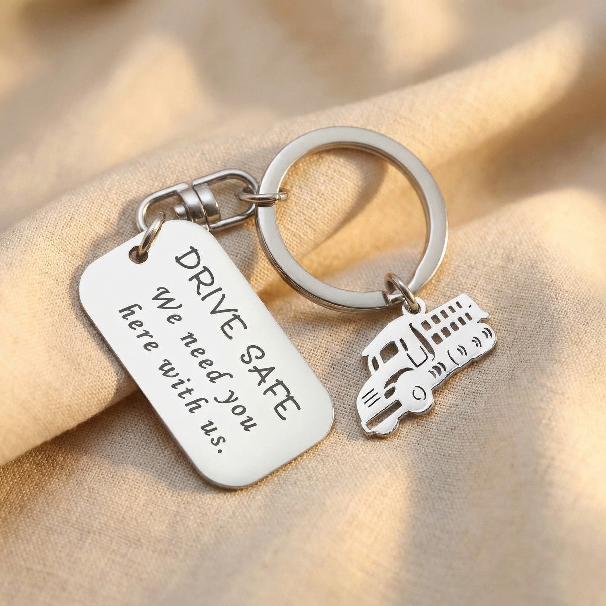 Personalised dog tag keyring with additional charm and engraved tag, custom keepsake design