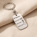 Personalised dog tag keyring in silver with engraved message, classic minimalist design