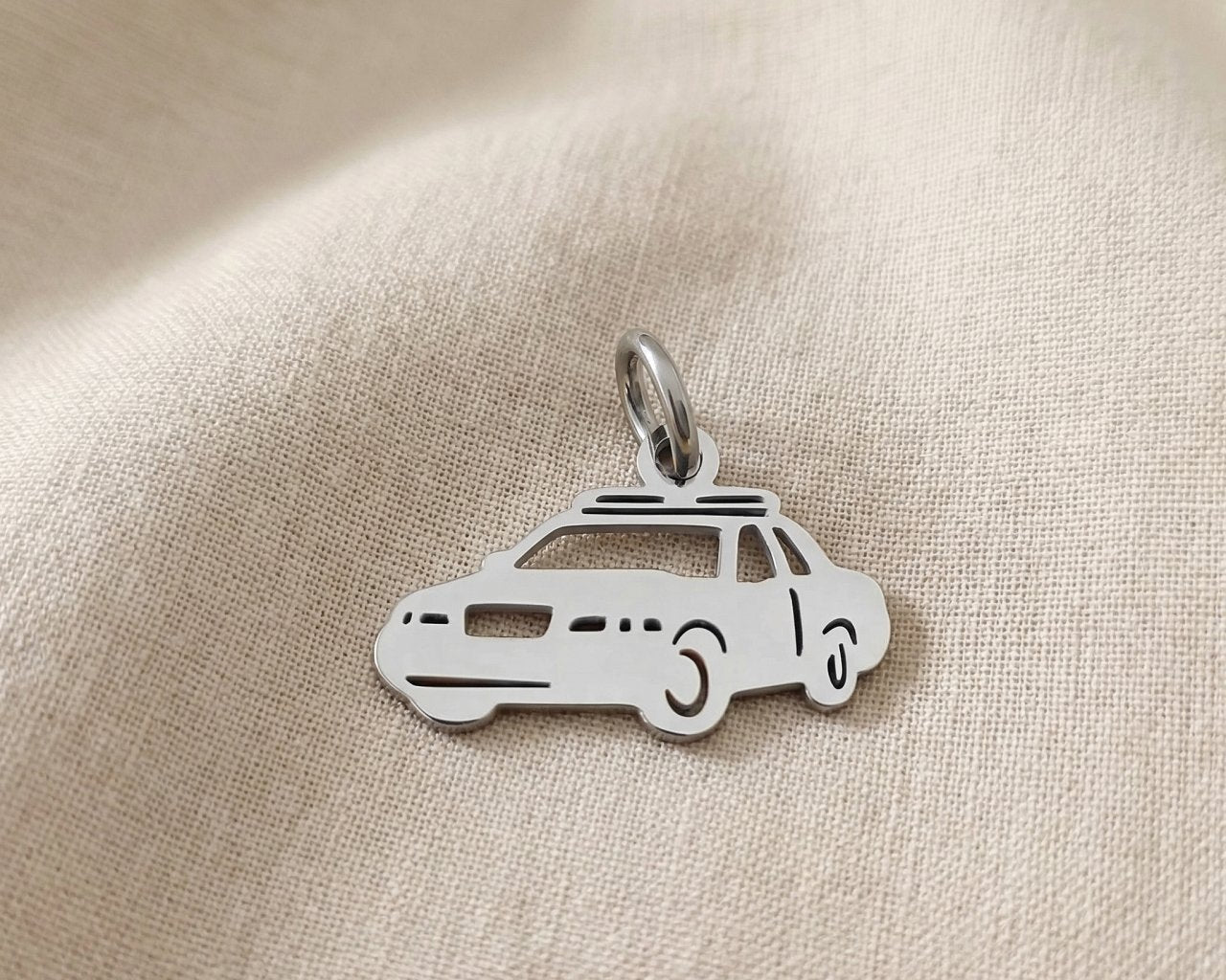 Silver police car charm for keyring honoring law enforcement, service, and meaningful appreciation gifts