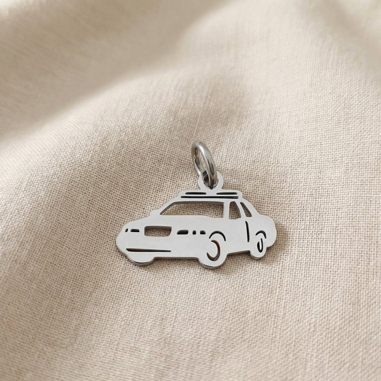 Silver police car charm for keyring honoring law enforcement, service, and meaningful appreciation gifts