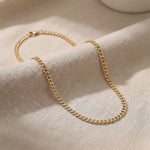 Product video showing curb chain necklace with classic flat link chain design